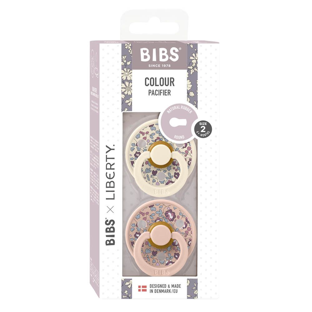 Boîte de deux sucettes BIBS x Liberty Eloise Blush 6-18 mois. Fenêtre transparente. Motifs floraux.