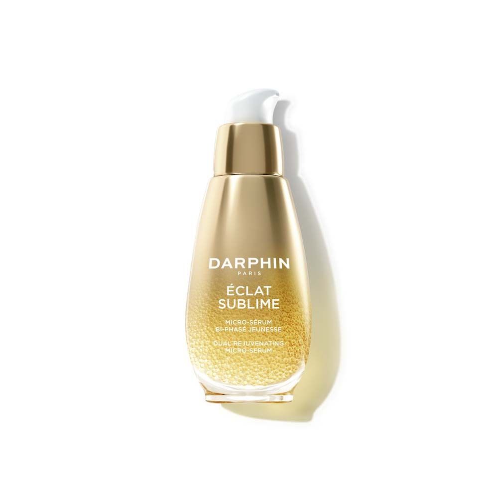Flacon Darphin Eclat Sublime avec pompe, couleur or.