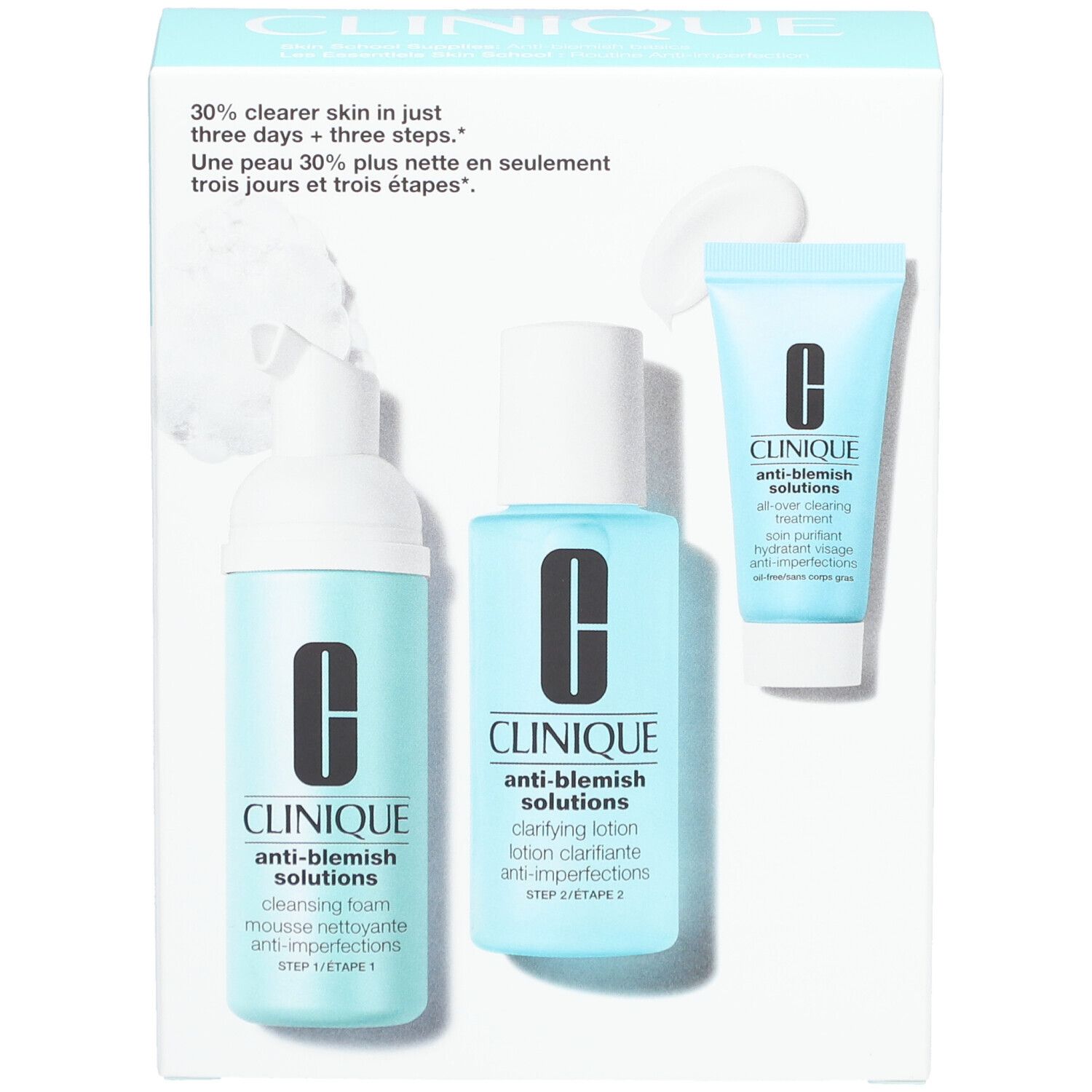 Coffret Clinique Anti-Blemish avec trois produits. Texte : peau plus nette en trois jours. Skin School. Emballage bleu clair.