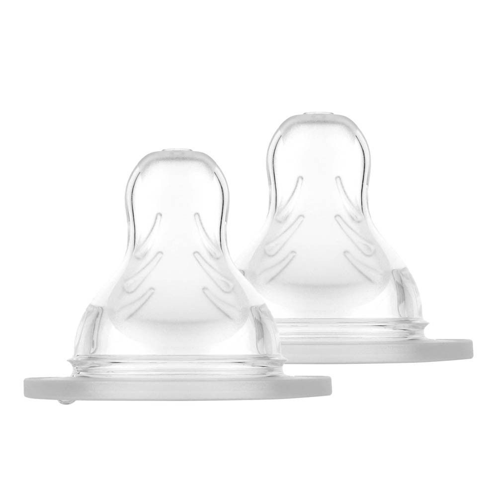 Deux tétines MAM 3 en silicone SkinSoft transparent, isolées sur fond blanc.