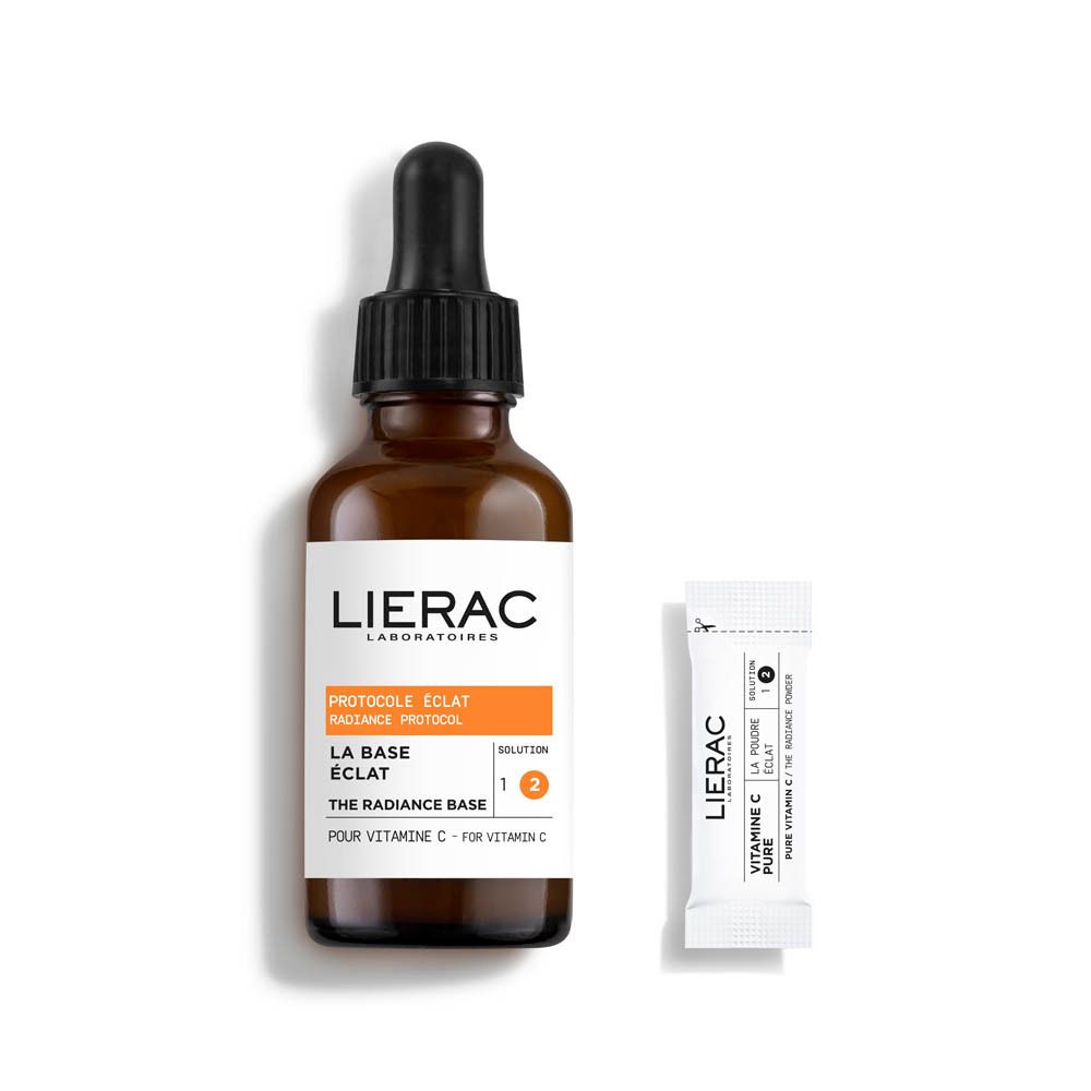 Flacon en verre brun avec pipette et sachet blanc. Logo LIERAC et informations produit visibles.