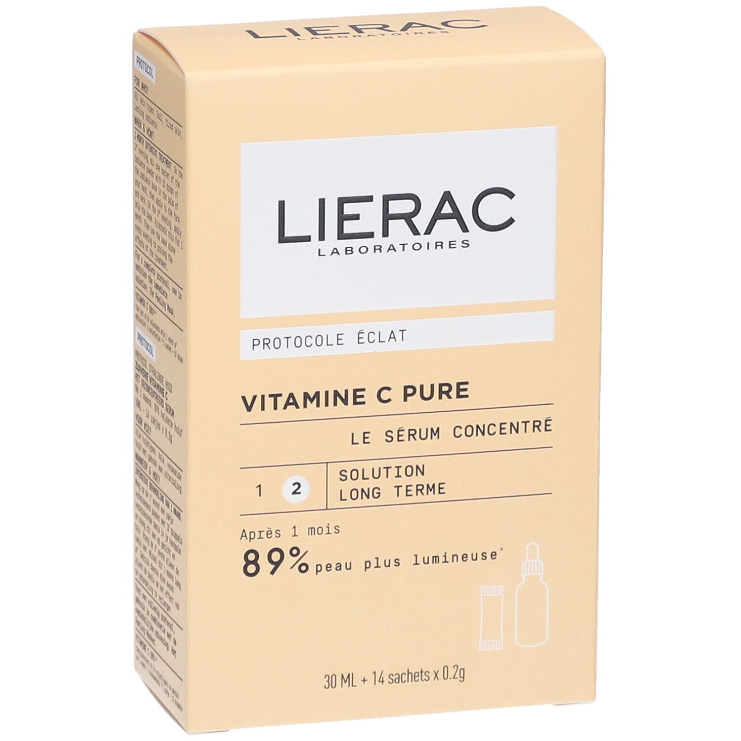 Boîte en carton beige avec logo LIERAC et informations produit. Contient des illustrations de sérum et de sachet.