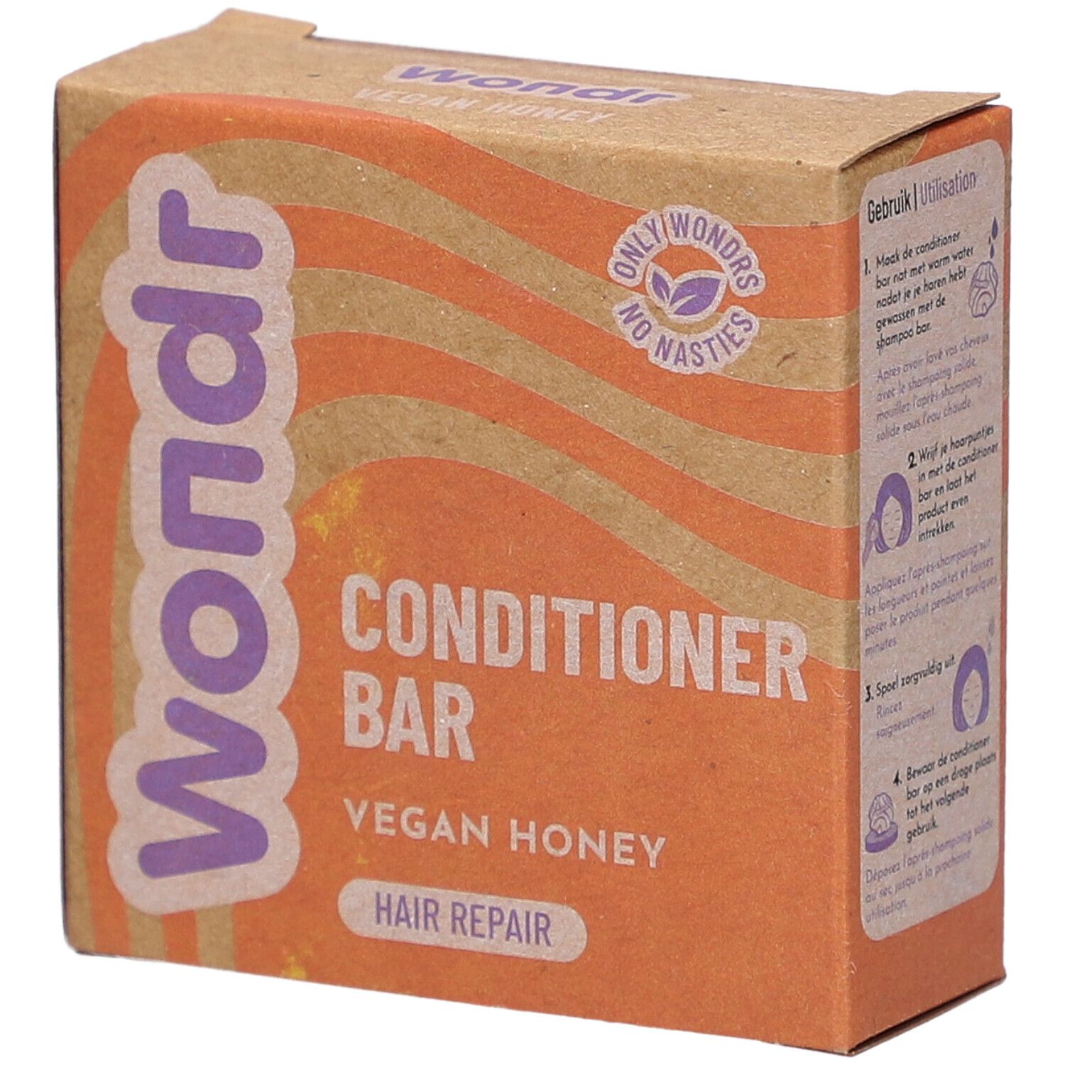 Boîte en carton avec nom et description du produit. Inscription : Wondr Conditioner Bar Vegan Honey Hair Repair.