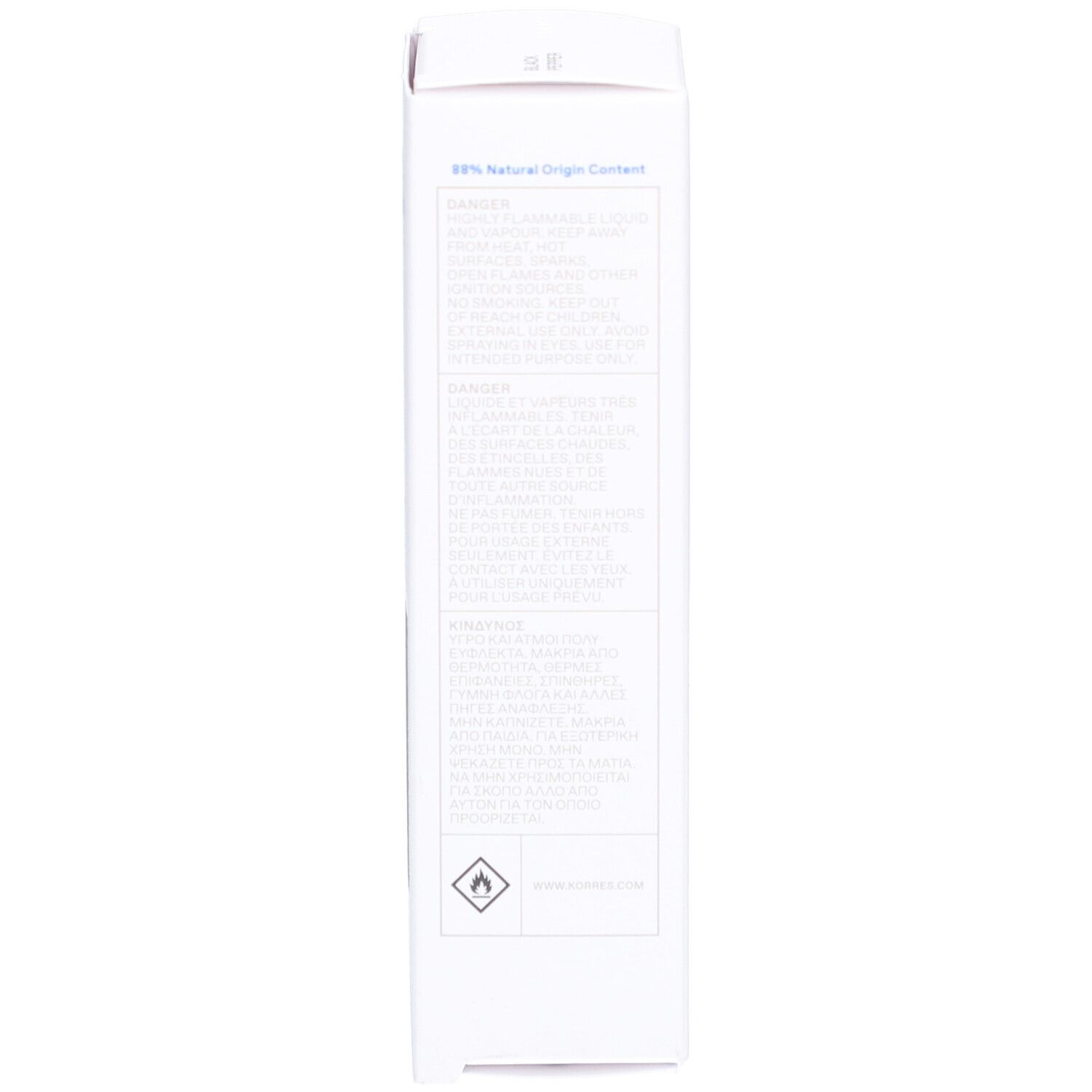 Boîte rectangulaire blanche avec texte. Contient des informations sur les ingrédients et les avertissements.