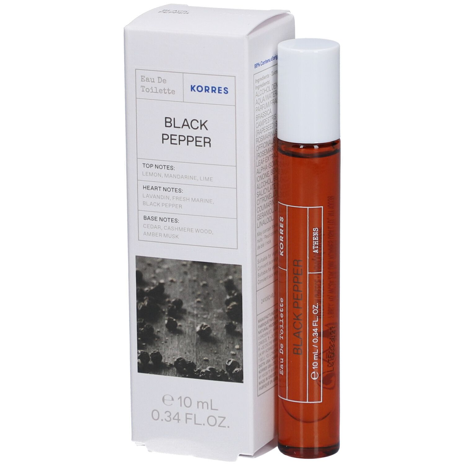 Flacon en verre brun avec bouchon blanc et boîte. La boîte indique "Black Pepper" et "Korres".