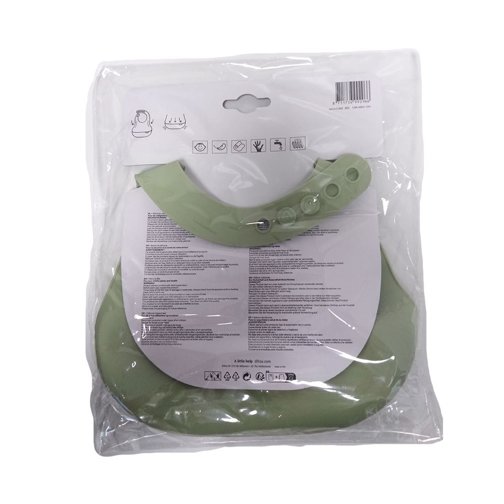 Dos du bavoir en silicone dans un emballage plastique. Couleur pistache. Marque Difrax. Informations et symboles.