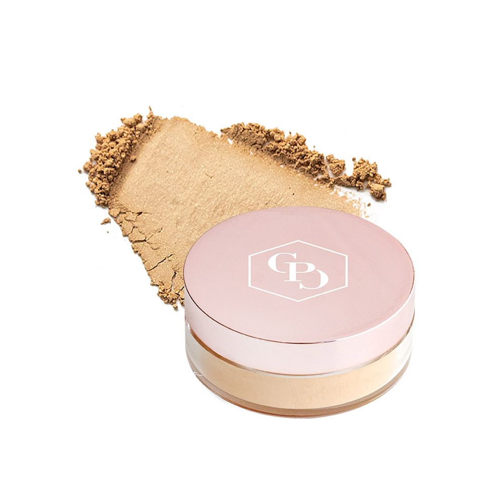 Pot rond avec couvercle rose et échantillon de poudre. Inscription: Cent Pur Cent. Produit et application.