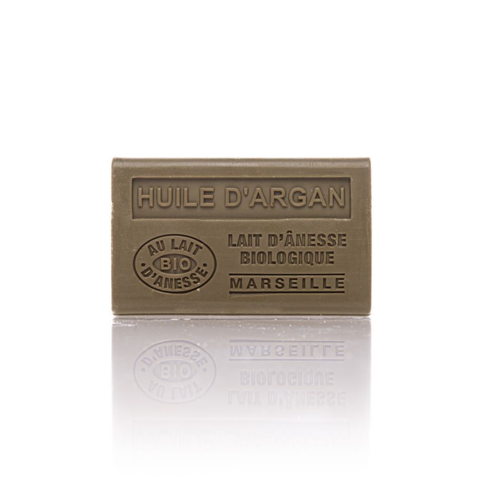Savon rectangulaire avec inscription 'Huile d'Argan', 'Au Lait d'Anesse Bio'.