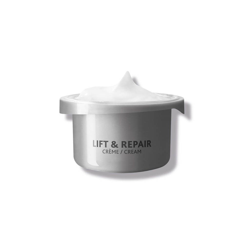 Produit en pot. Inscription: Lift & Repair Crème/Cream. Texture crème visible.