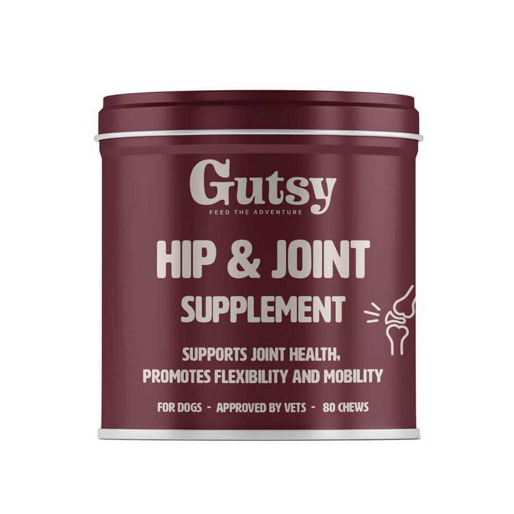 Boîte marron 'Gutsy Hip & Joint Supplement'. Soutient la santé articulaire et la mobilité. Avec 80 friandises à mâcher.