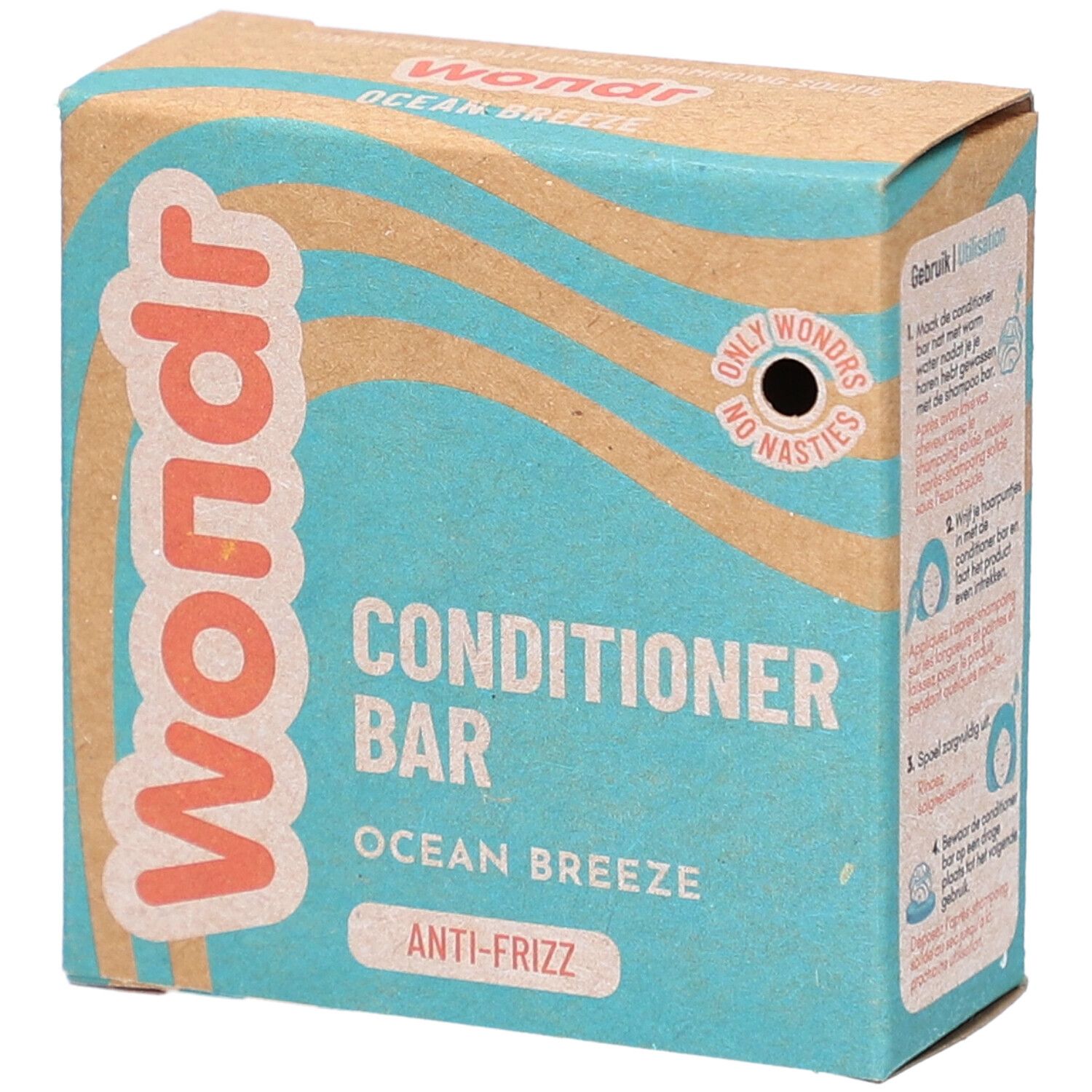 Boîte en carton. Inscription : Wondr, Conditioner Bar, Ocean Breeze, Anti-Frizz. Motif vagues et logo.
