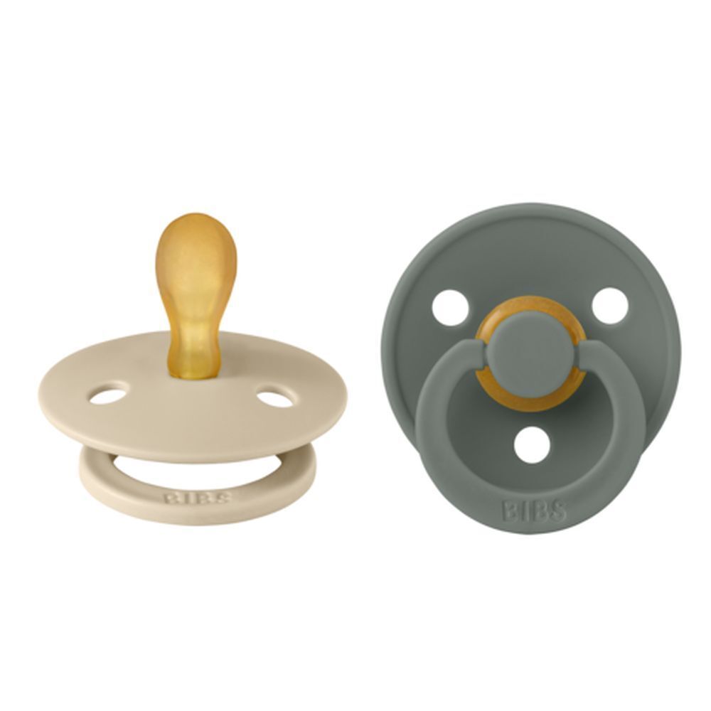 Deux sucettes BIBS. Beige et vert gris. Forme symétrique.