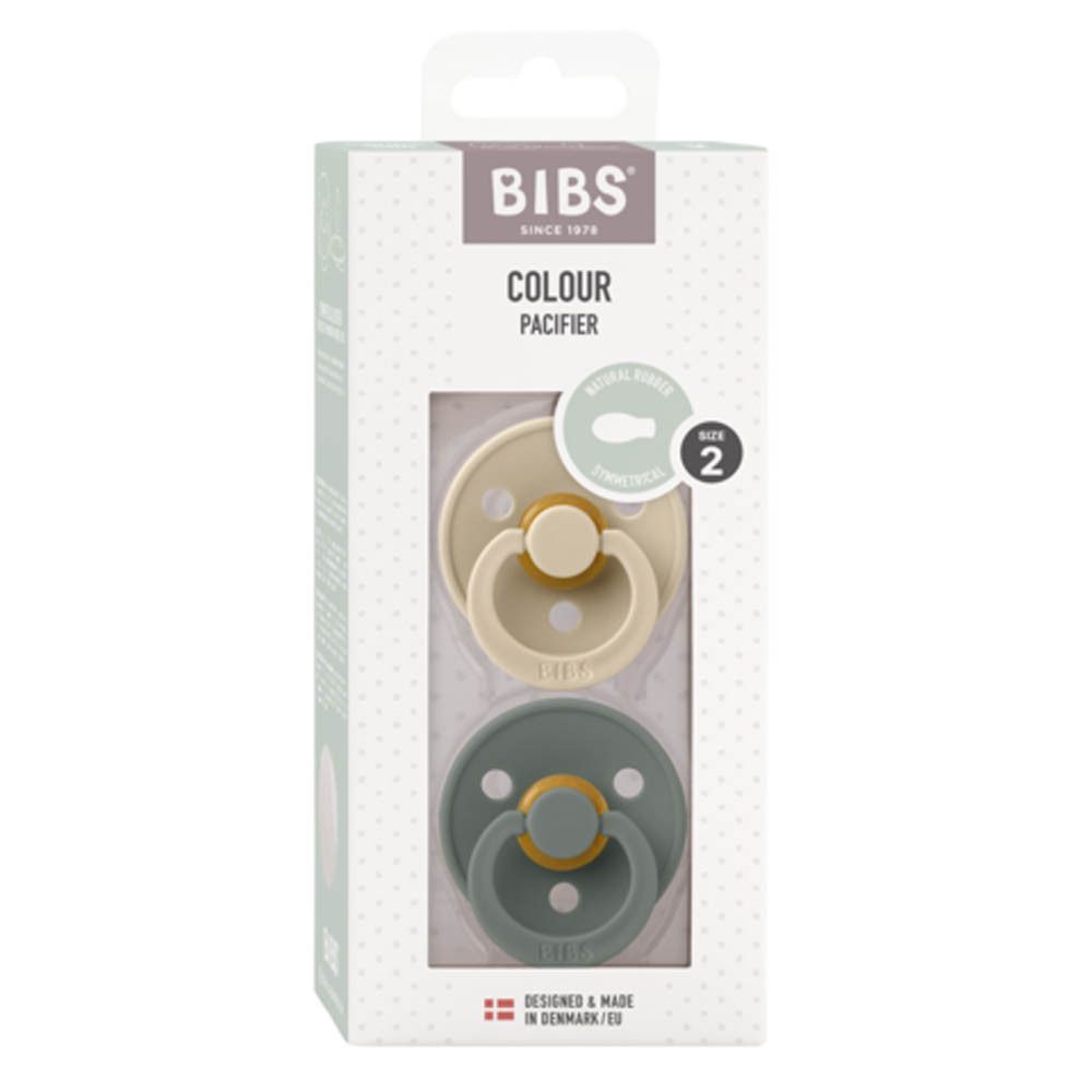 Boîte de sucettes BIBS Colour. Deux sucettes vertes et beiges. Taille 2. Tétine symétrique. Emballage avec fenêtre.