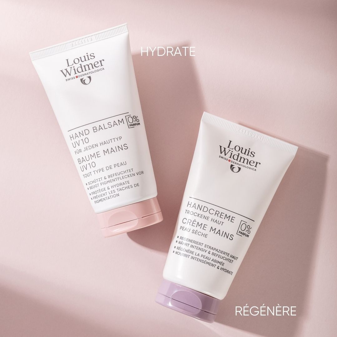 Deux tubes de crème pour les mains. Inscription: Louis Widmer, Handcreme et Handbalsam UV10. Bouchons violets et roses.
