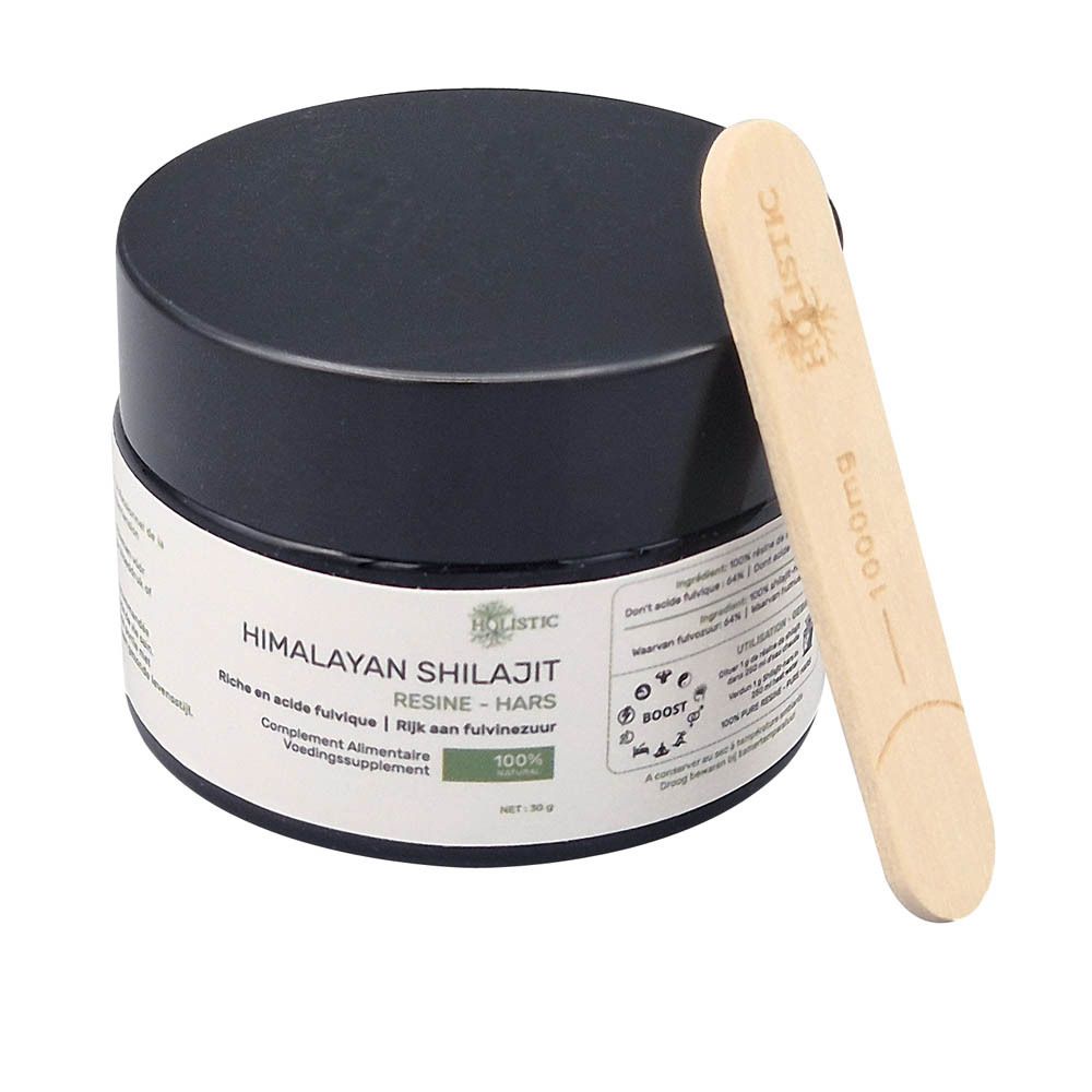 Pot noir "Holistic Himalayan Shilajit Résine" et spatule en bois. Fond blanc.