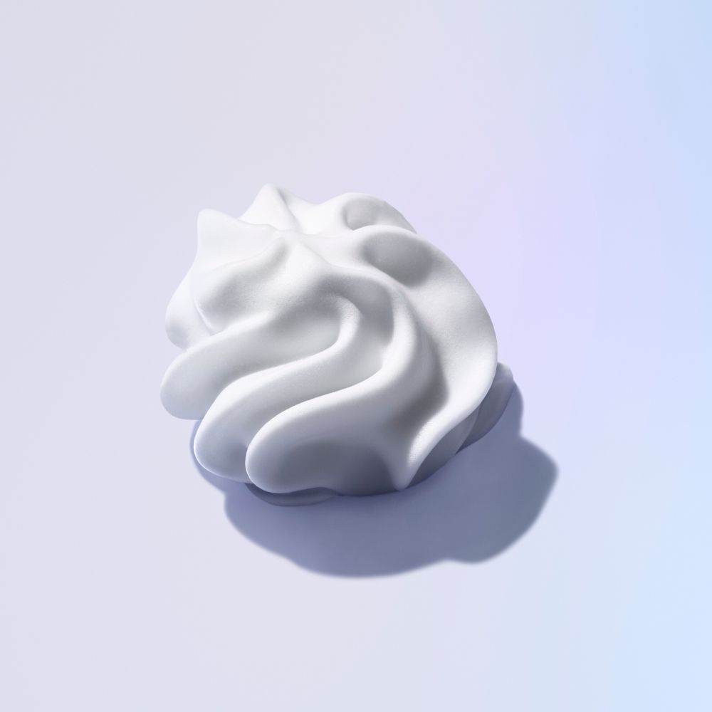 Arrière d'un flacon spray blanc avec pompe, étiqueté Institut Esthederm Osmoclean.