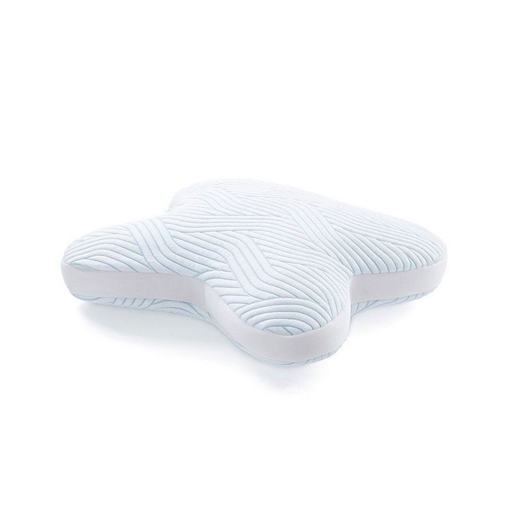 Oreiller blanc avec surface ondulée. Forme papillon.