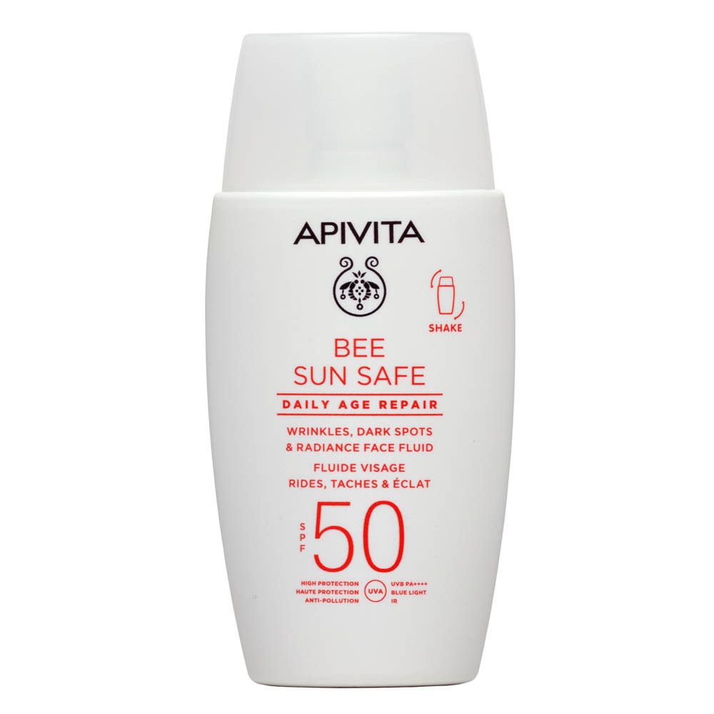 Flacon blanc de protection solaire. Marque: Apivita Bee Sun Safe. SPF 50. Bouchon et texte.