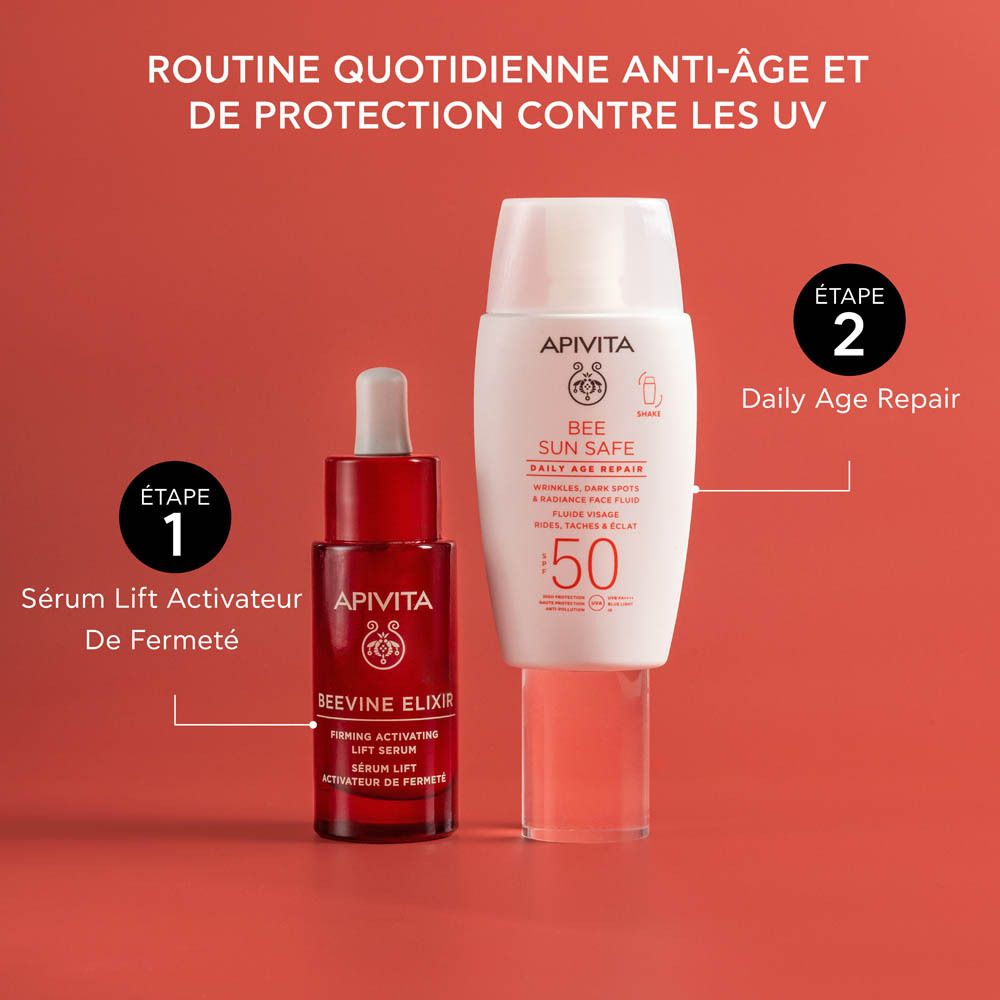 Flacon blanc de protection solaire. Marque: Apivita Bee Sun Safe. SPF 50. Bouchon et texte.