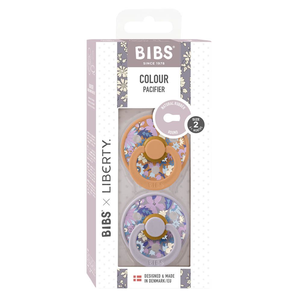 BIBS x Liberty, 2 sucettes dans un emballage. Sucettes orange et violettes à motifs floraux. Taille 6-18 mois.