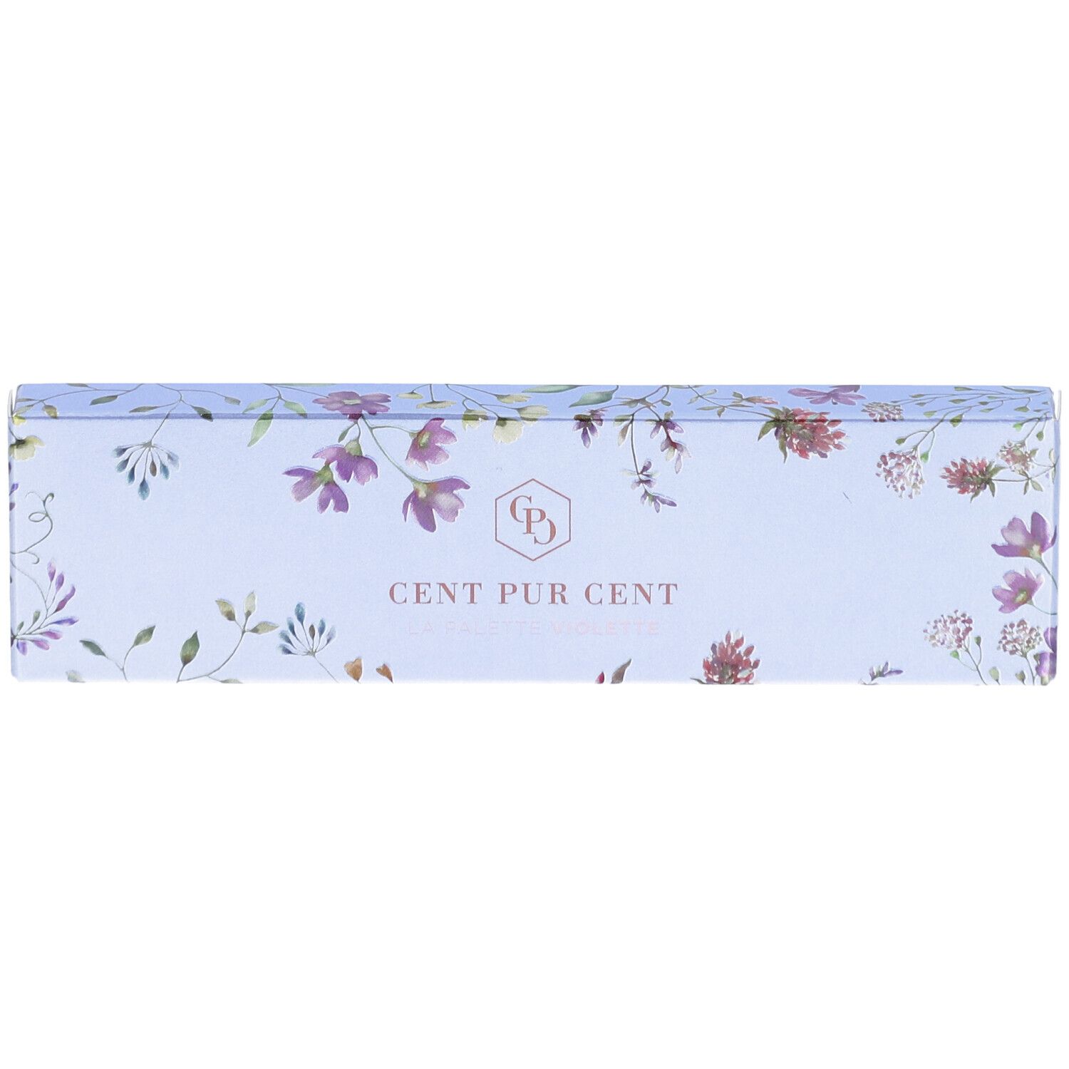 Vue de dessus de l'emballage avec motif floral et texte CENT PUR CENT. Fond bleu clair.