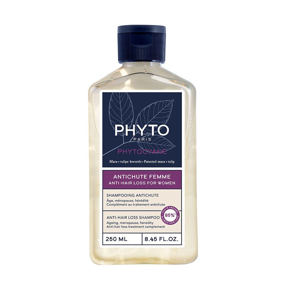 Flacon de shampooing Phyto Paris Anti-Chute Femme. Bouchon bleu. Étiquette avec informations produit et logo.