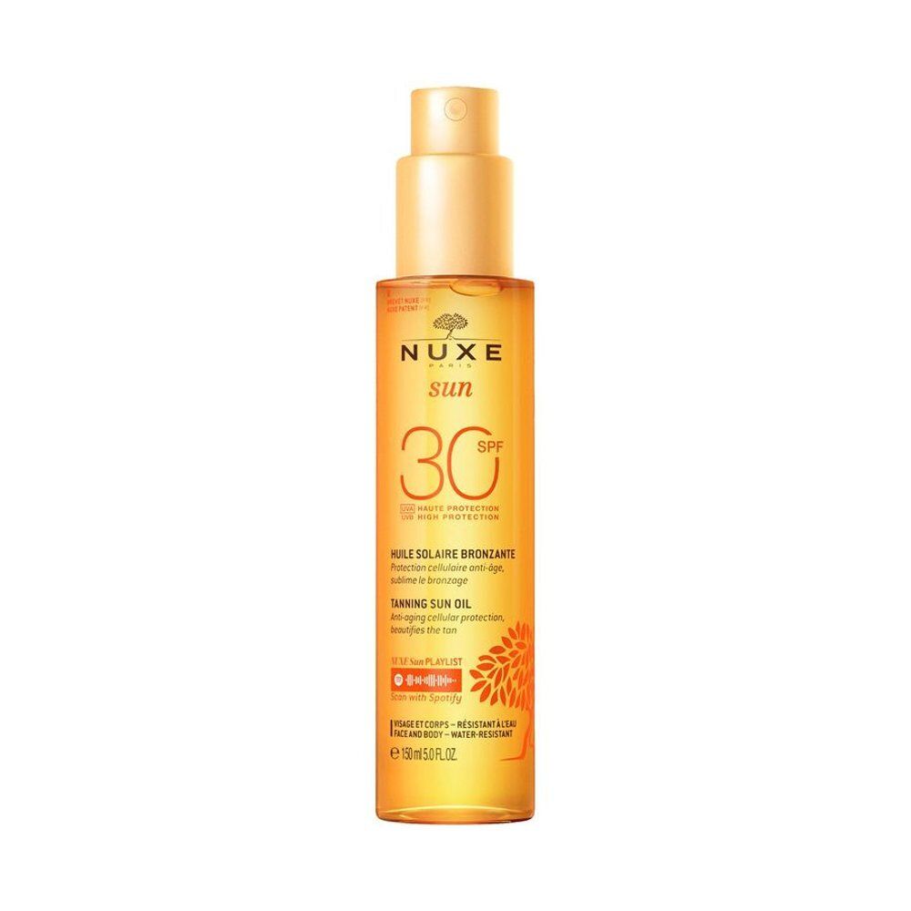 Nuxe Sun Huile Solaire Bronzante SPF 30, liquide doré dans un flacon transparent avec pompe.