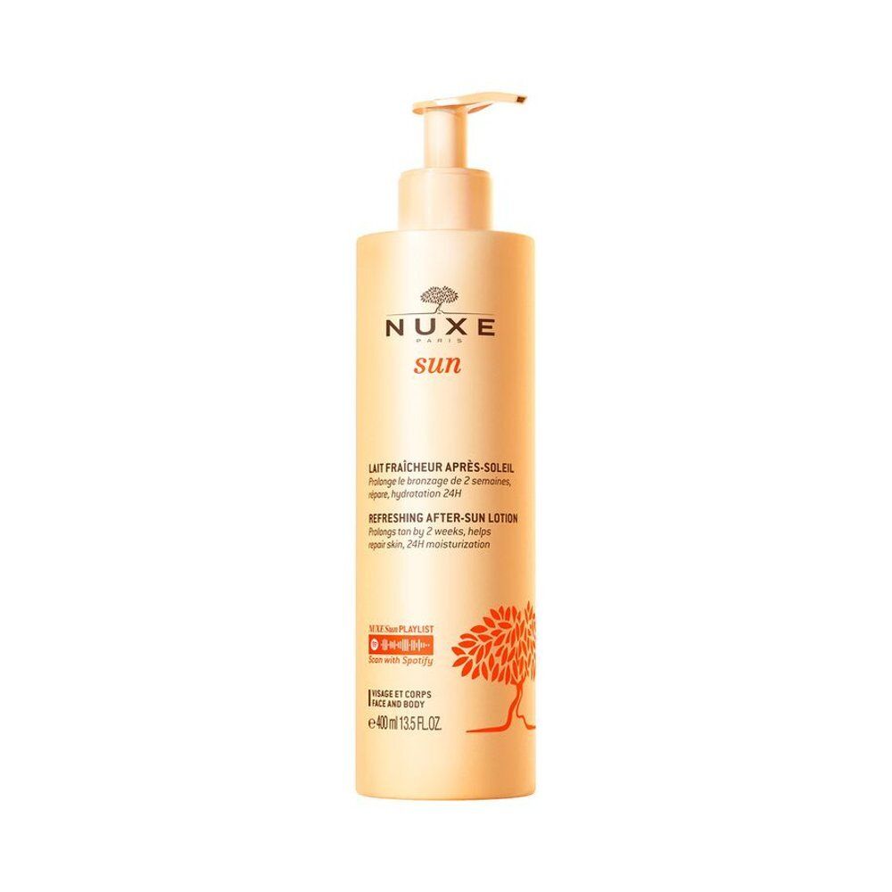 Lait Fraîcheur Après-Soleil Nuxe Sun en flacon doré avec pompe et illustration d'arbre.