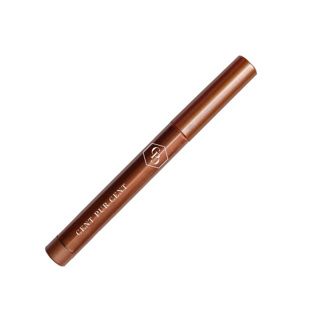 Cent Pur Cent Eyeconic Stick Kupfer : Un bâtonnet fin de couleur cuivre avec un capuchon argenté.