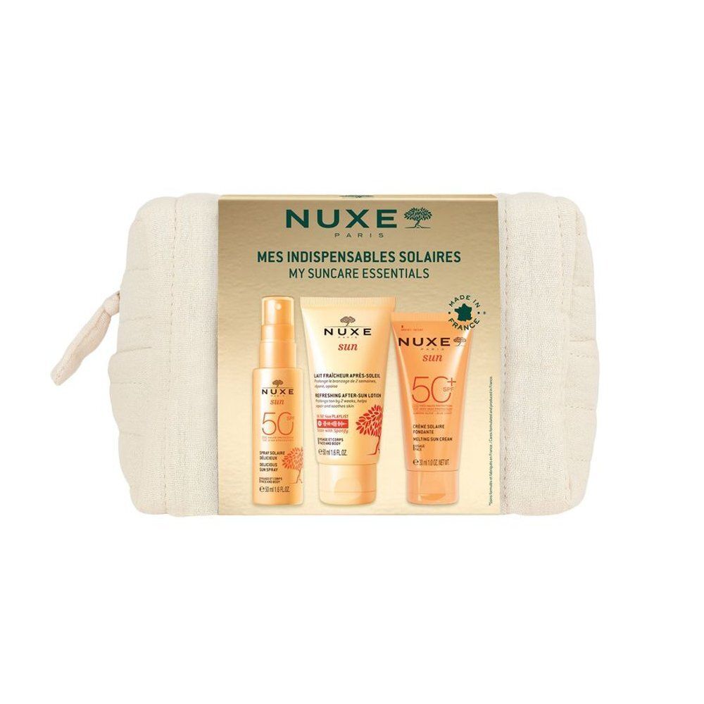 Trousse de voyage Nuxe Sun avec spray solaire, lotion après-soleil et crème solaire dans une trousse de toilette.