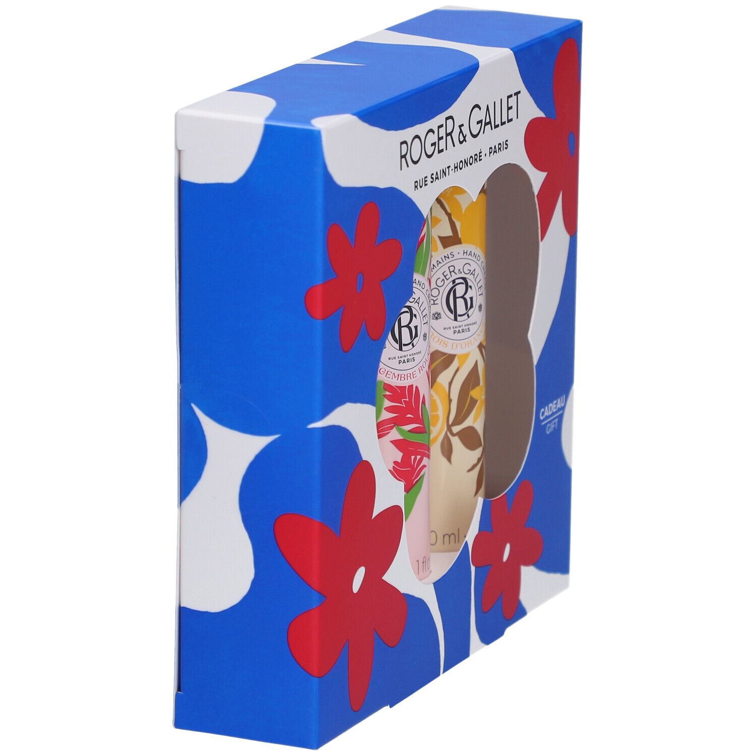 Vue latérale du coffret cadeau avec trois crèmes pour les mains. Boîte bleue à motifs floraux. Logo Roger & Gallet.