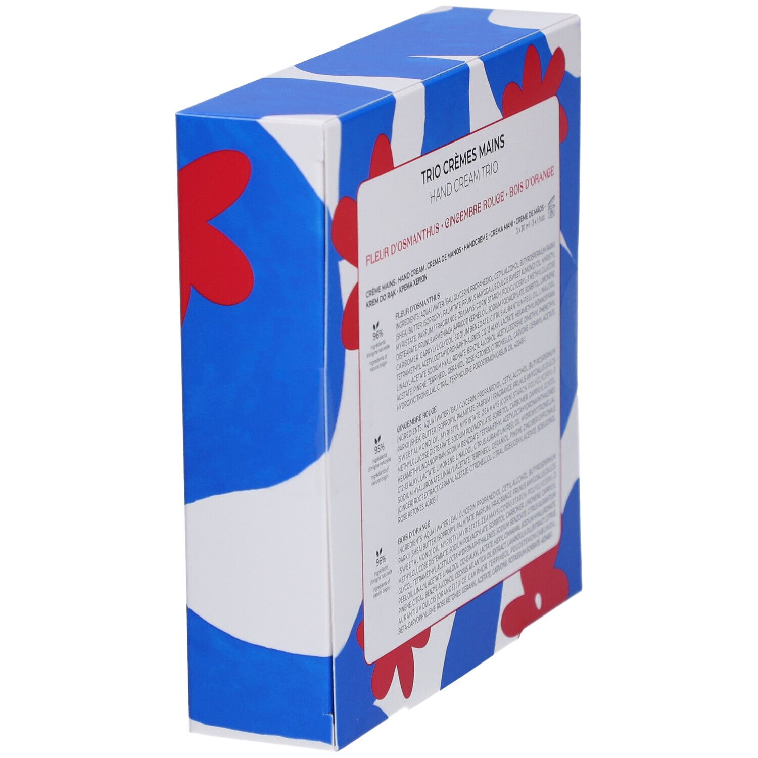 Vue latérale du coffret cadeau avec texte et ingrédients. Boîte bleue à motifs floraux. Texte multilingue.