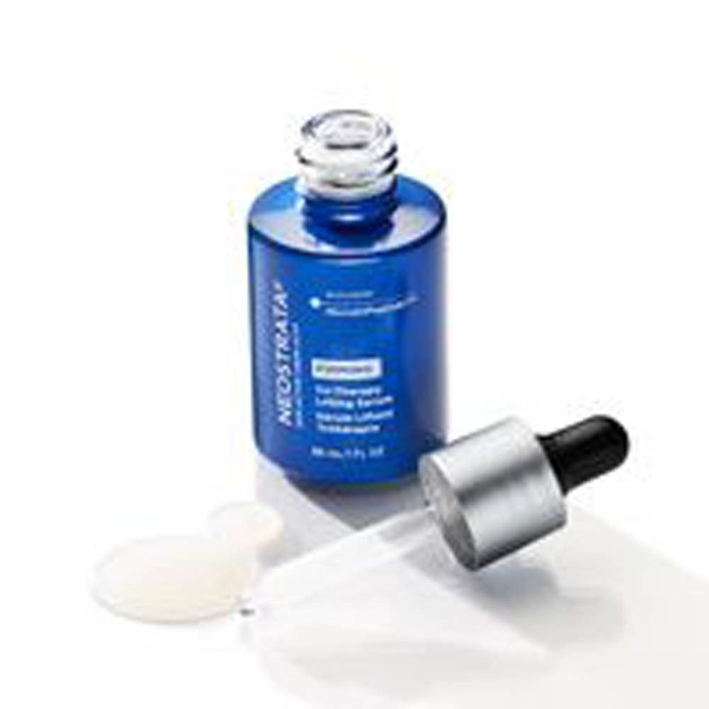 Flacon avec pipette, sérum à côté. Inscription : Neostrata, Skin Active, Derm Actif. Nom du produit : Tri-Therapy Lifting Serum.