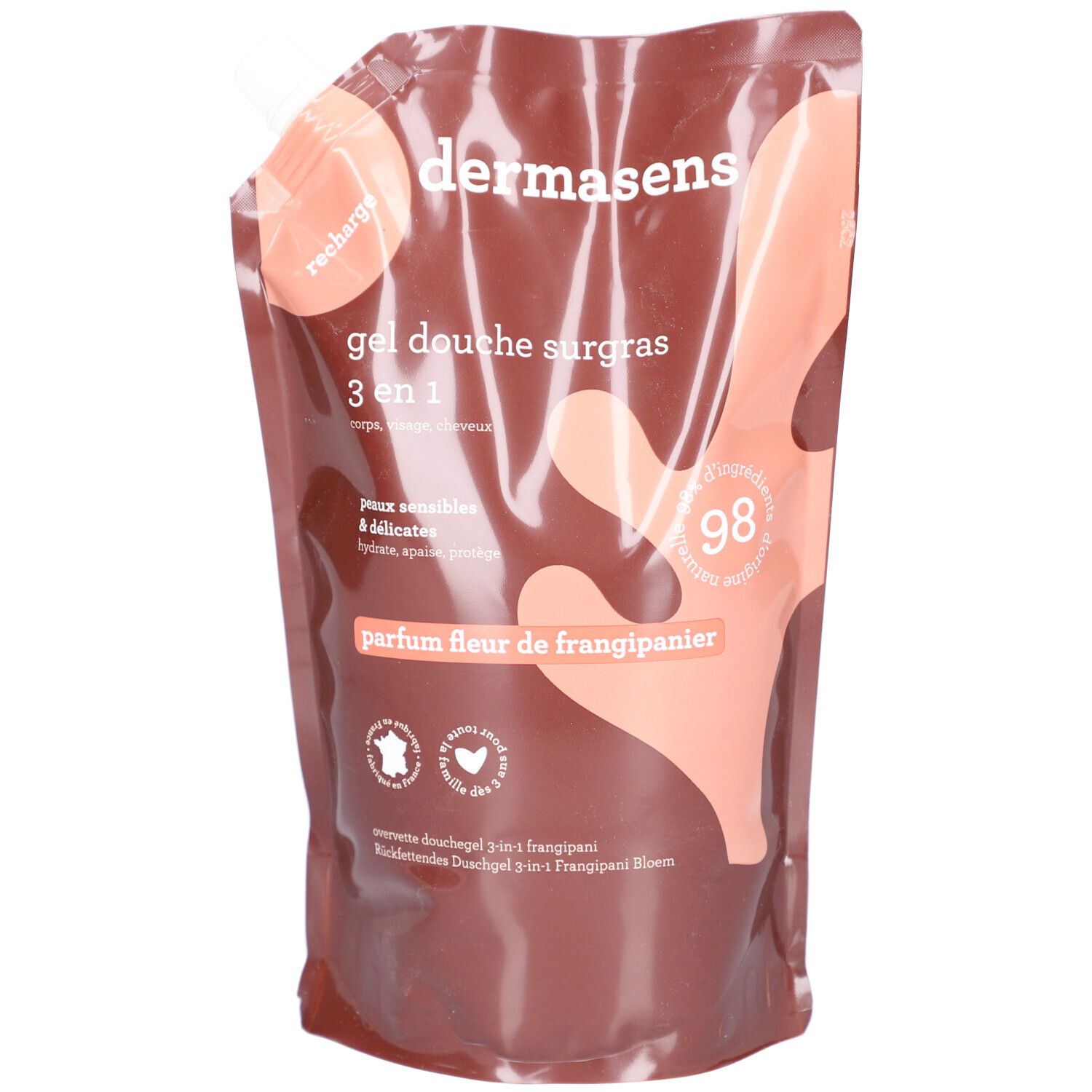 Recharge DERMASENS. Texte: Gel douche surgras 3 en 1, parfum fleur de frangipanier. Emballage souple, marron et rose.