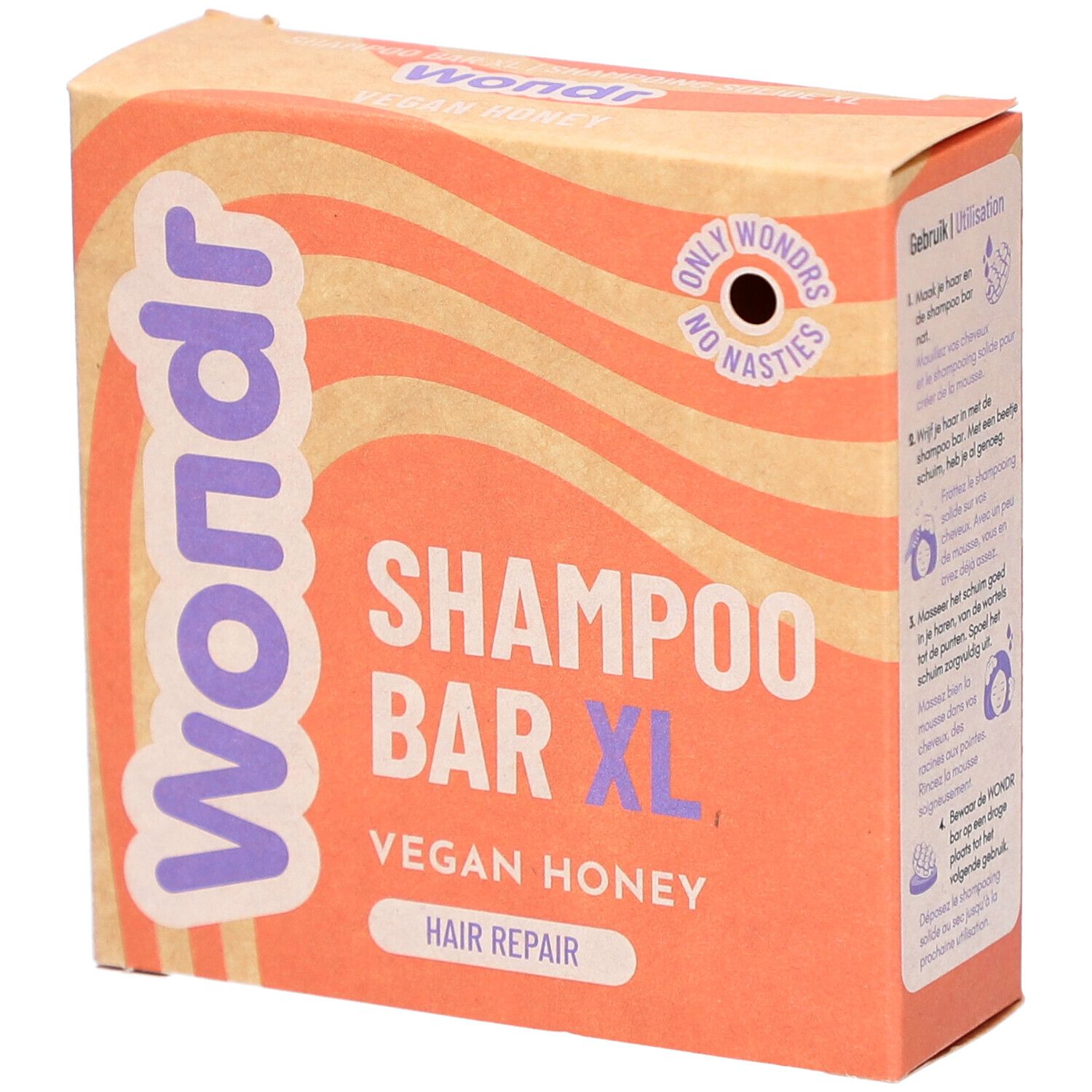 Emballage en carton Wondr, Shampoo Bar XL, Vegan Honey. Fond ondulé orange et beige.