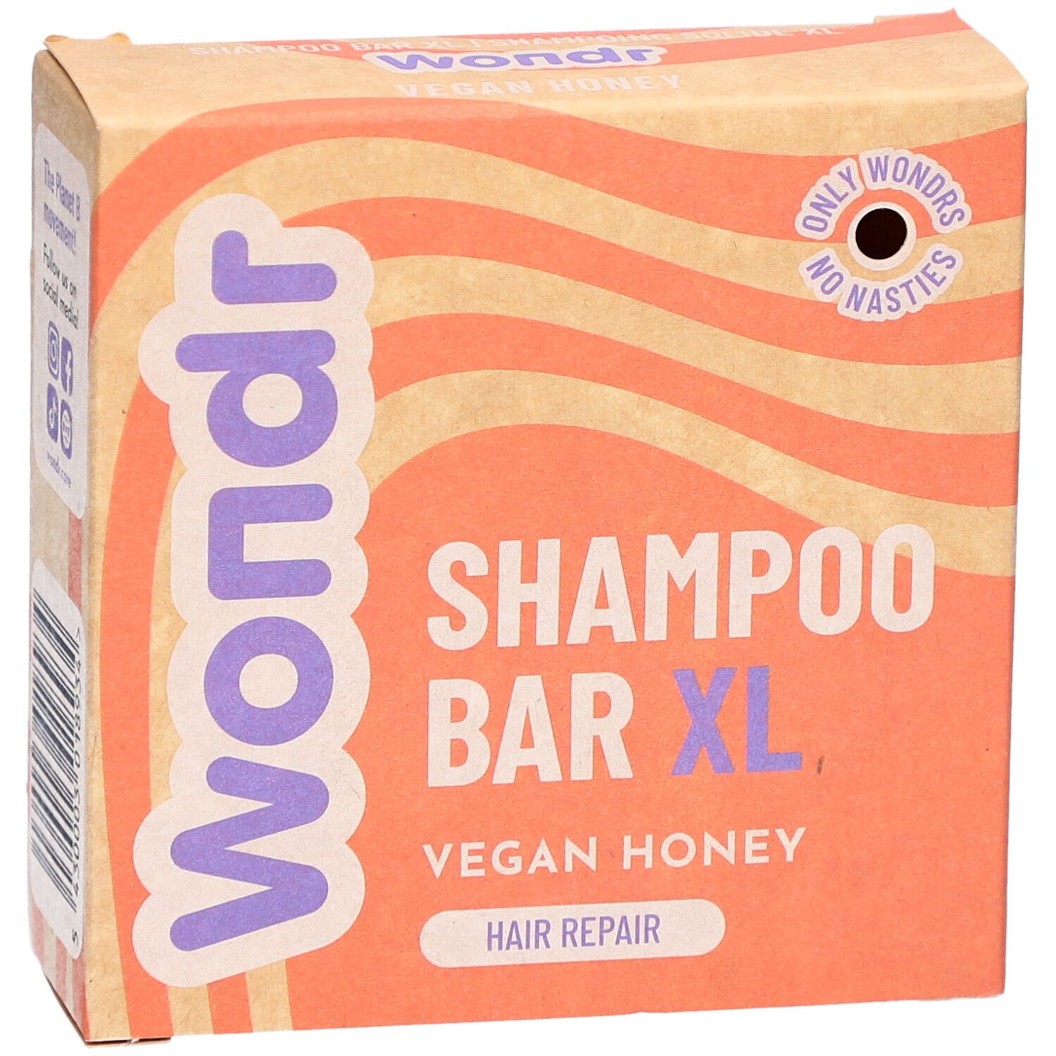 Emballage en carton Wondr, Shampoo Bar XL, Vegan Honey. Fond ondulé orange et beige.