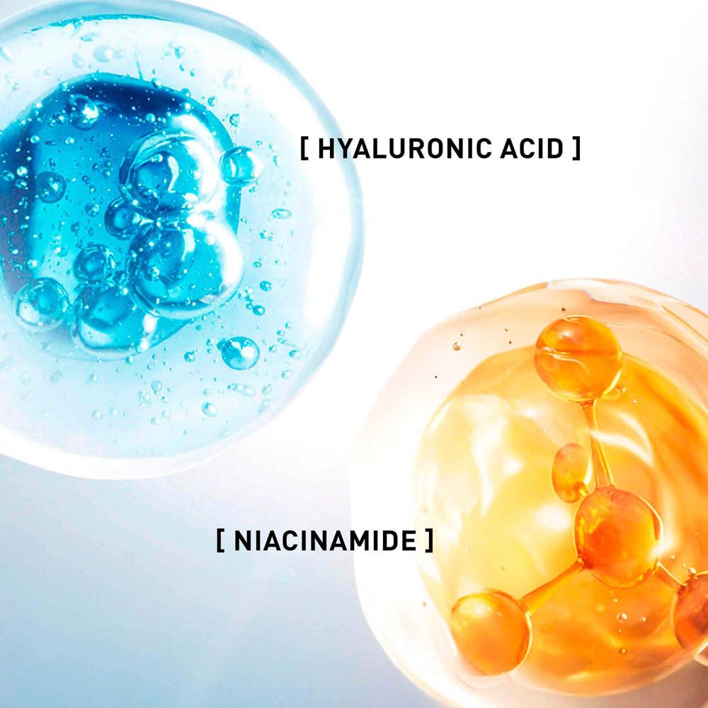 Gros plan sur l'acide hyaluronique et la niacinamide. Liquides bleus et jaunes. Fond scientifique.