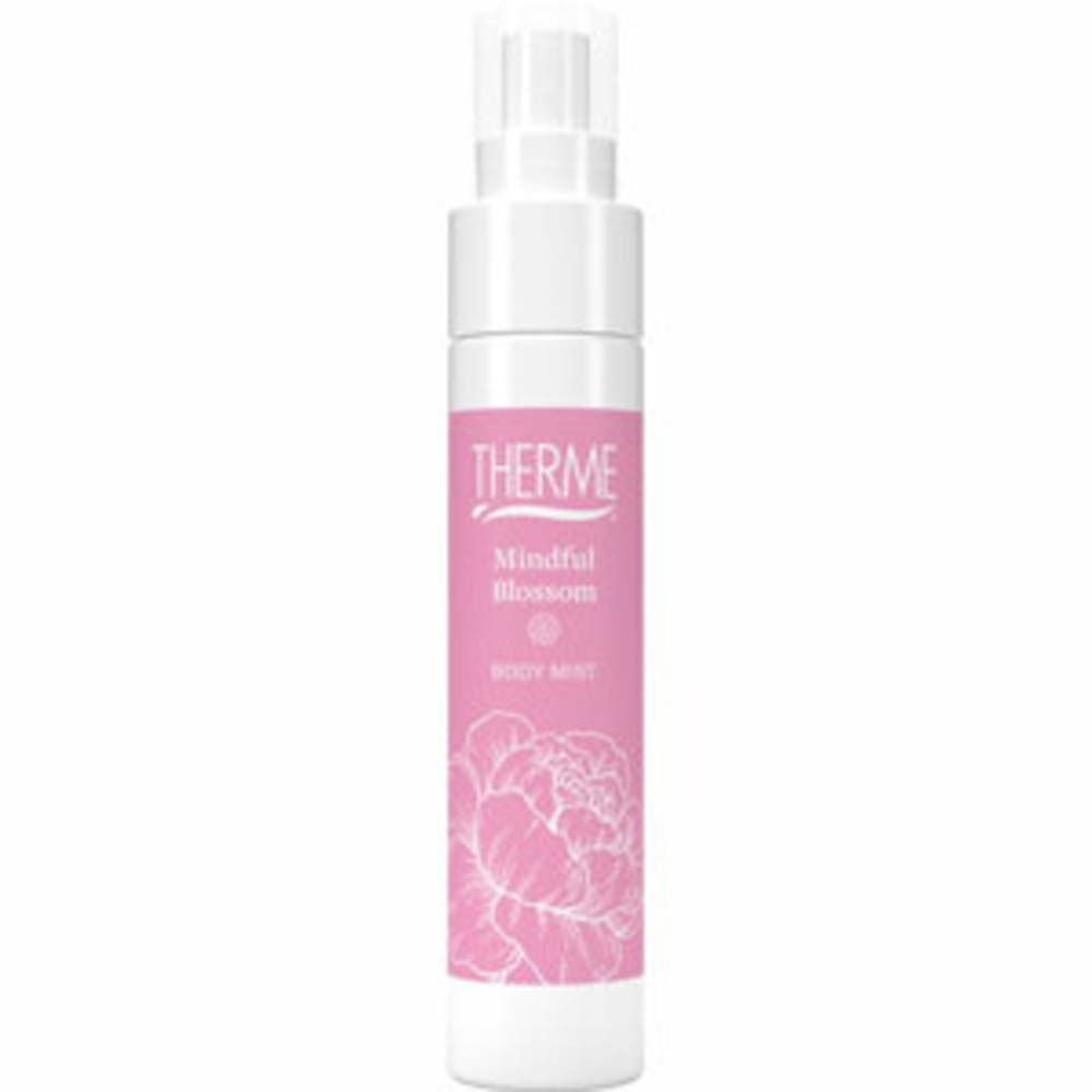 Flacon de brume corporelle. Tête de pulvérisation blanche, étiquette rose avec texte et motif floral. Marque THERME, nom du produit Mindful Blossom.