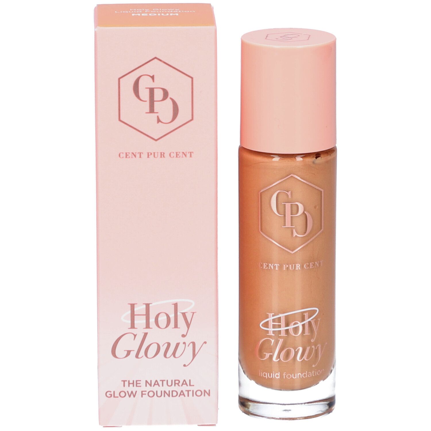 Fond de teint et emballage. Inscription: Holy Glowy, Cent Pur Cent, The Natural Glow Foundation.