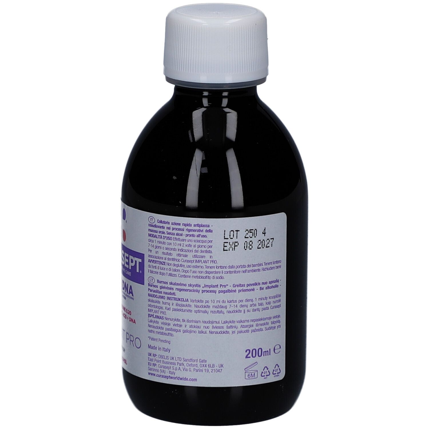Liquide foncé dans une bouteille en verre brun avec un bouchon à vis blanc. Étiquette avec informations produit et mention 200ml.