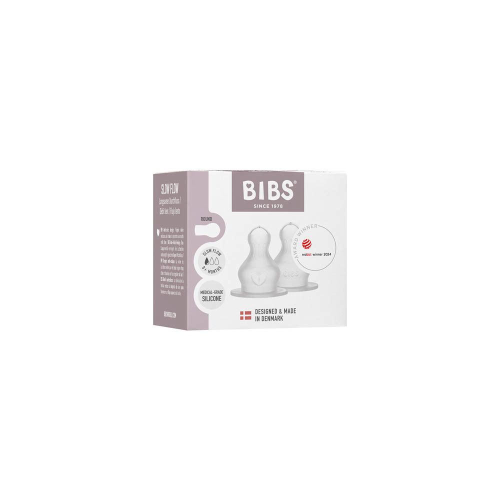 Emballage de deux tétines BIBS. Forme ronde, débit lent, 0+ mois, design anti-colique, silicone de qualité médicale.