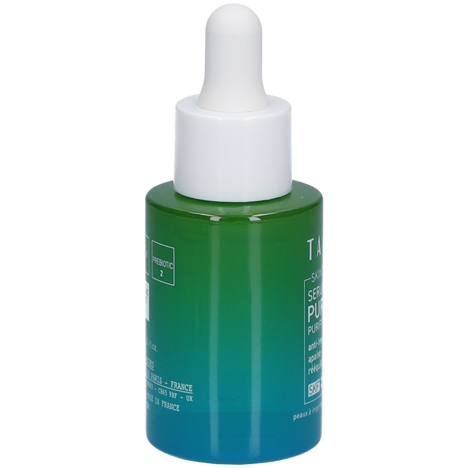 Dos d'un flacon vert avec bouchon blanc et pipette. Inscription : Talika Skin Intelligence Serum Purifiant.