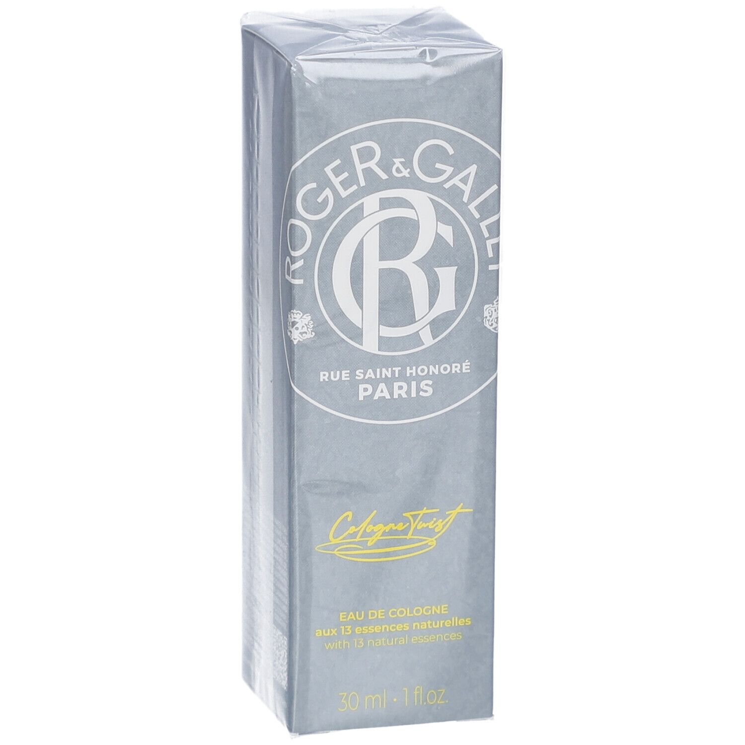 Boîte rectangulaire grise avec logo et texte. Inscription: Eau de Cologne, 30 ml - 1 fl oz. Emballé dans du film plastique.