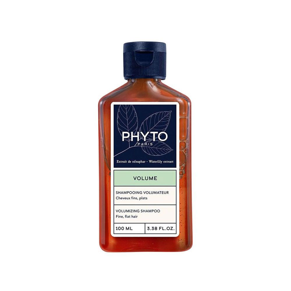 Flacon de shampooing brun avec bouchon bleu. Étiquette "PHYTO PARIS" et "VOLUME". Texte en français et anglais.