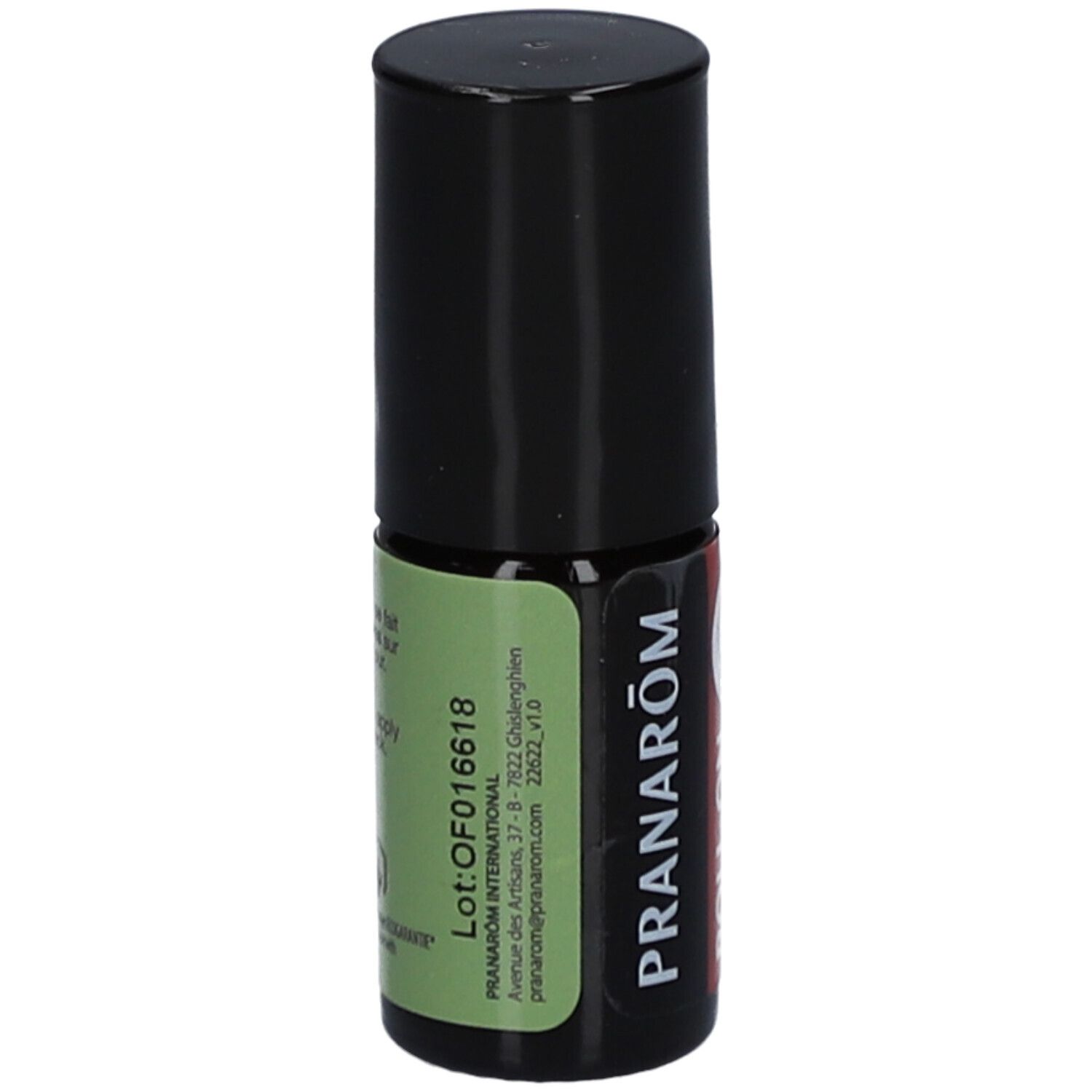 Petite bouteille cylindrique noire. Étiquette verte et blanche avec texte et logo. Marque Pranarôm visible.