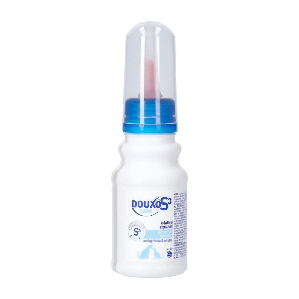 Boîte aérosol blanche avec informations produit et symboles de danger.