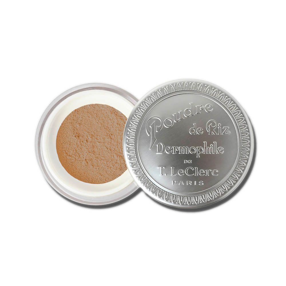 Boîtier rond argenté avec poudre libre. Couvercle avec nom du produit. Marque T. LeClerc.