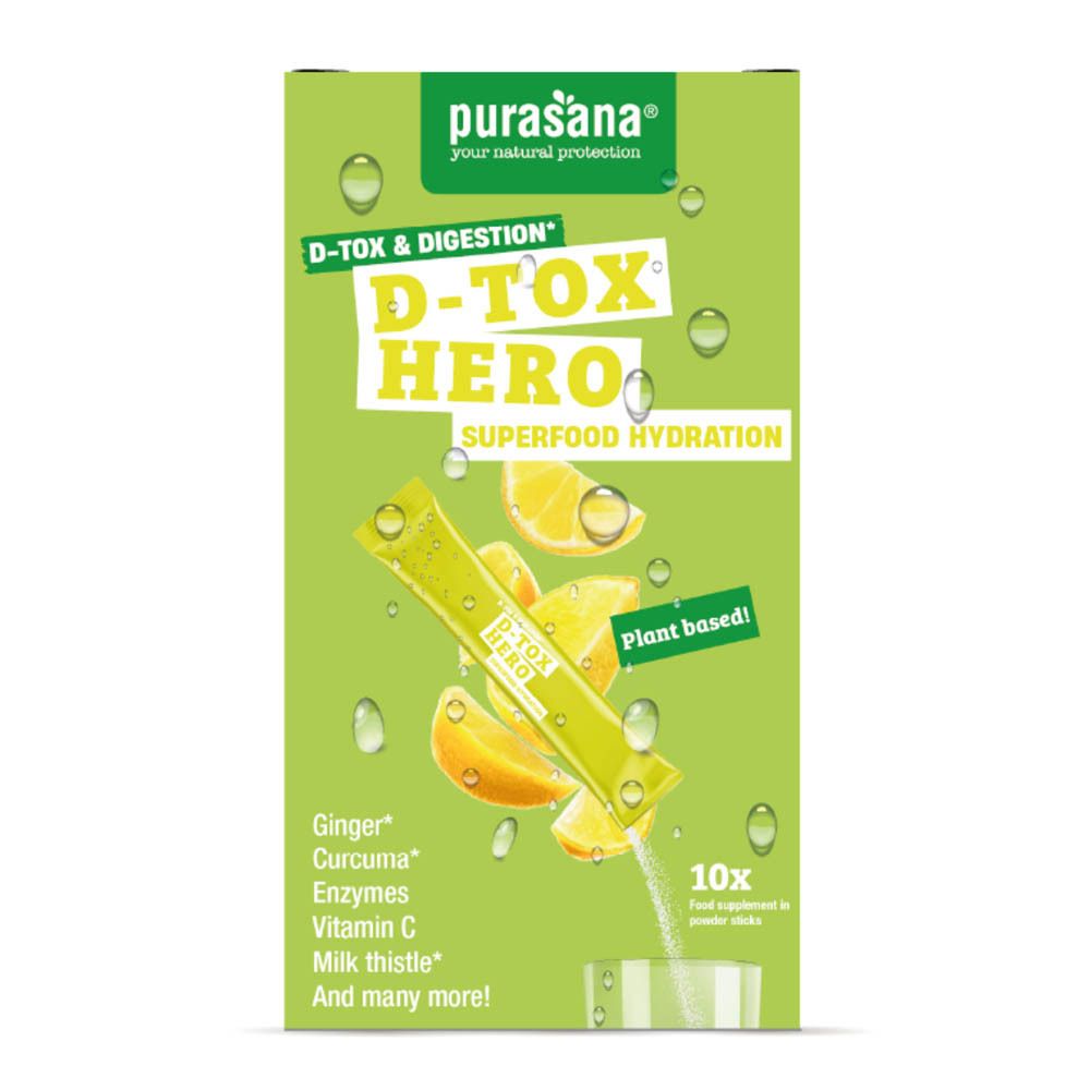 Boîte verte avec produit. Inscription: D-Tox Hero, Superfood Hydration. 10 sticks. Ingrédients: Gingembre, Curcuma, Enzymes, Vitamine C.