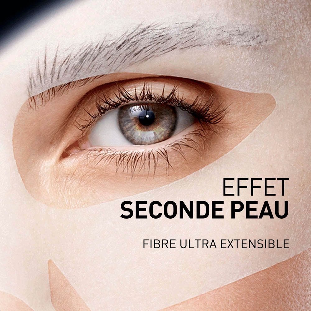 Gros plan d'un œil avec un masque pour la peau. Texte: Effet Seconde Peau, Fibre Ultra Extensible.