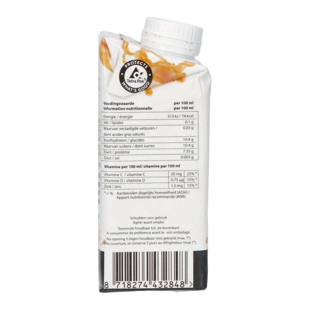 Dos de la brique. Informations nutritionnelles, vitamine C, D, zinc. Logo Tetra Pak.